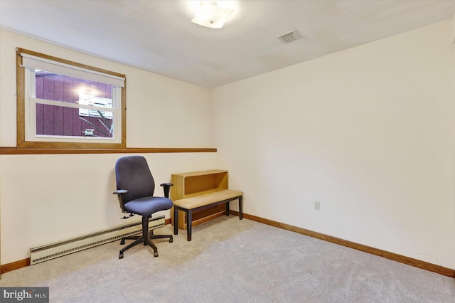 living area with light colored carpet and a baseboard heating unit