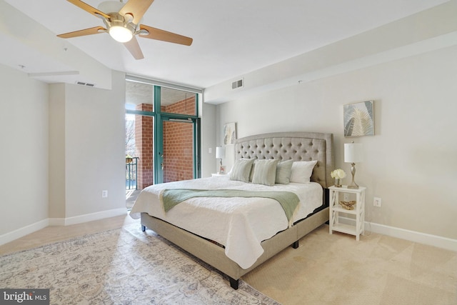 carpeted bedroom featuring access to exterior and ceiling fan