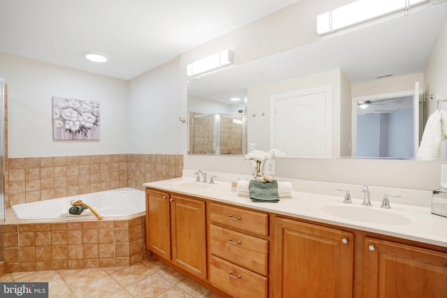 bathroom with vanity, tile patterned floors, and independent shower and bath