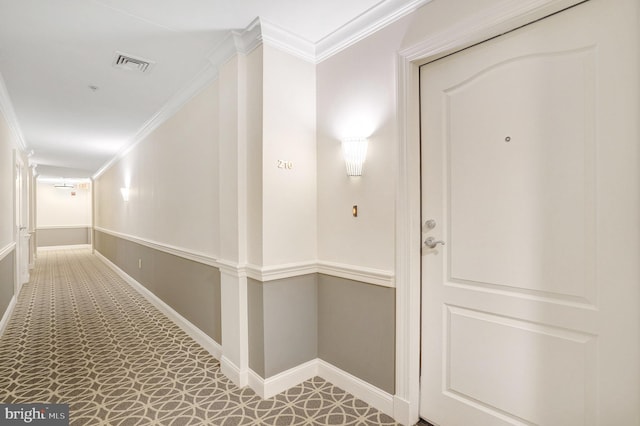 hallway with crown molding