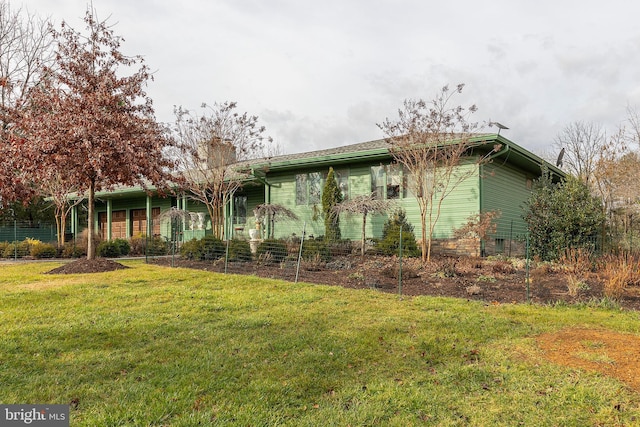 view of front of home with a front yard