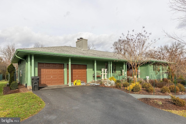 single story home featuring a garage