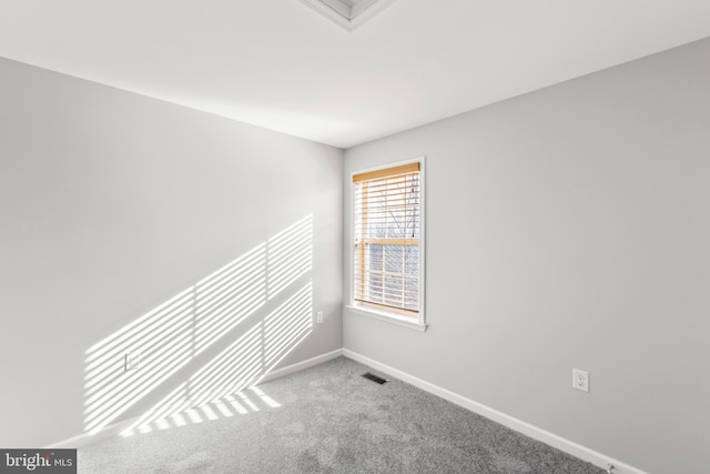 view of carpeted spare room