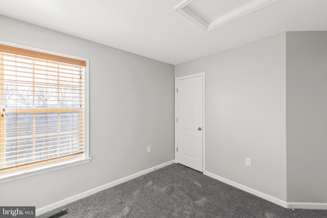 view of carpeted spare room