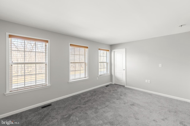 view of carpeted spare room