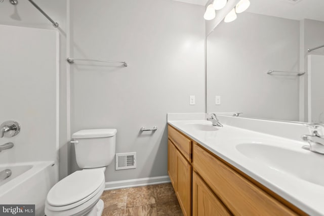 full bathroom with vanity, shower / bath combination, and toilet