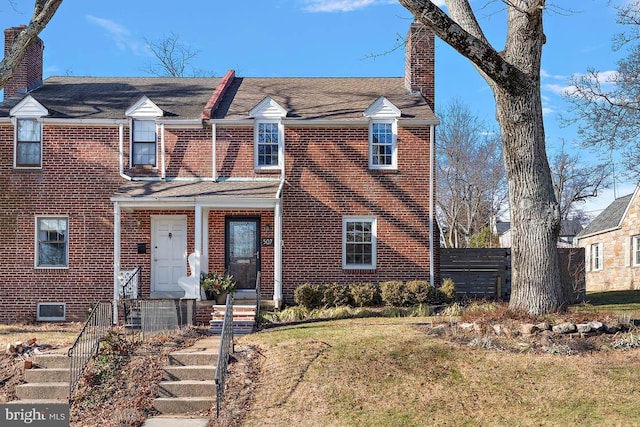 view of front facade featuring a front yard