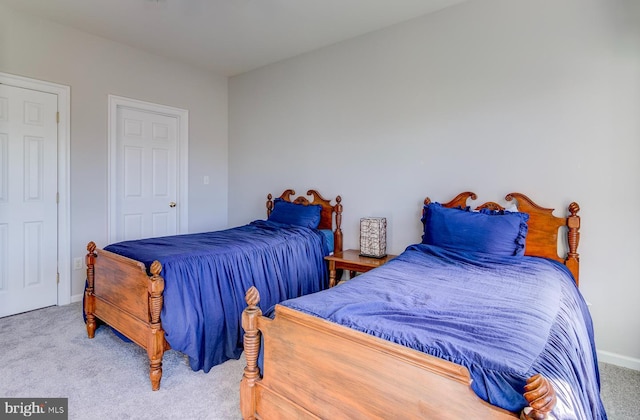 bedroom with light carpet