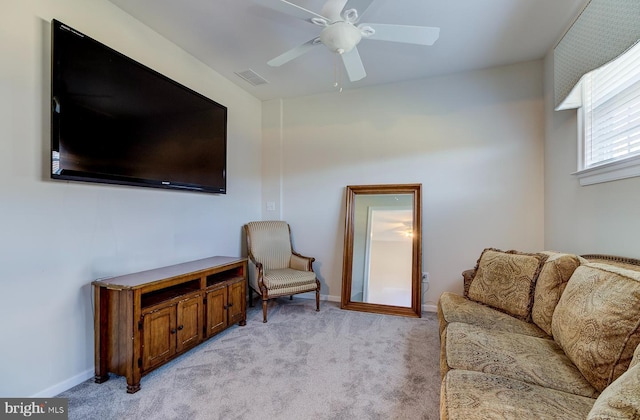 interior space featuring ceiling fan