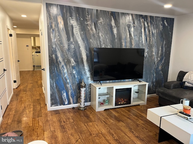 living room with dark hardwood / wood-style floors