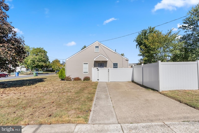 view of side of home featuring a yard