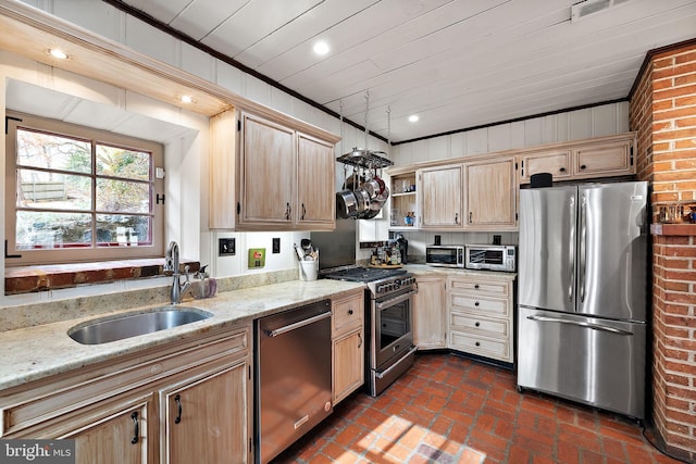 3007 Faulkland Rd, Wilmington, DE 19808 - kitchen featuring appliances with stainless steel finishes, a sink, open shelves, light stone countertops, and light brown cabinets