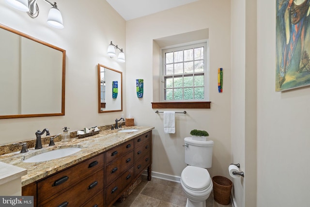 3007 Faulkland Rd, Wilmington, DE 19808 - full bath featuring baseboards, double vanity, and toilet
