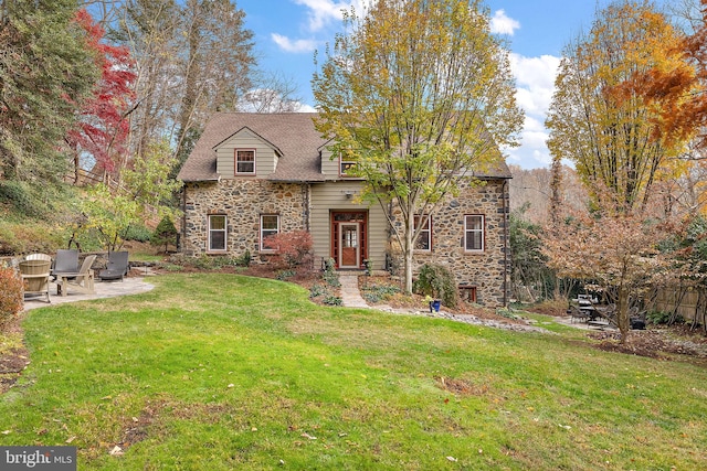 3007 Faulkland Rd, Wilmington, DE 19808 - view of front of home featuring stone siding, a front lawn, and a patio area