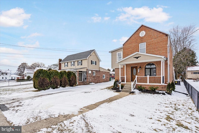 view of property with a porch