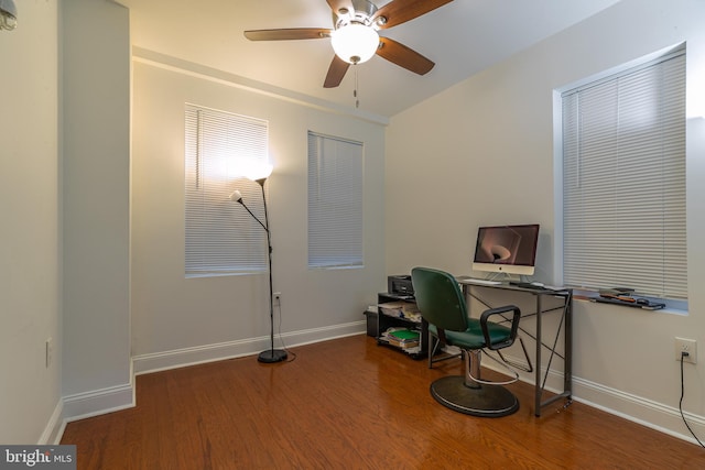 home office with wood-type flooring and ceiling fan