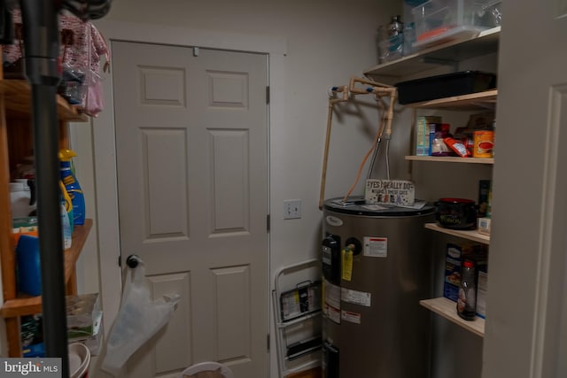 utility room with water heater