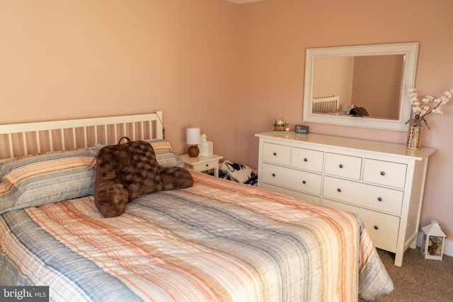 bedroom featuring carpet