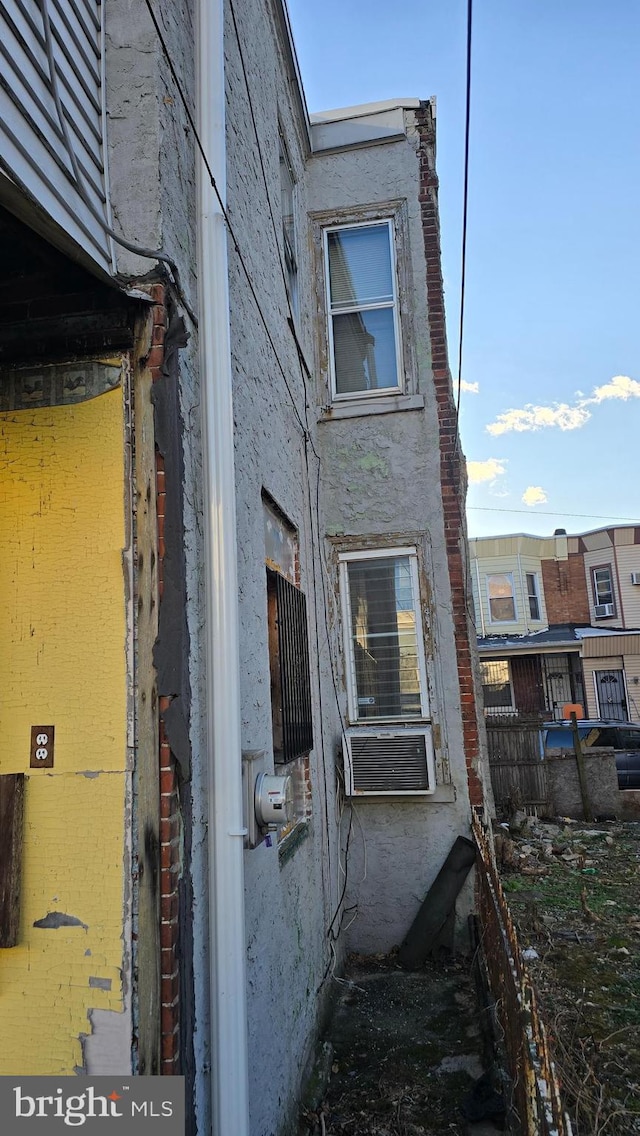 view of property exterior featuring cooling unit