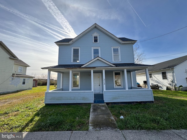 view of front facade featuring a porch and a front yard