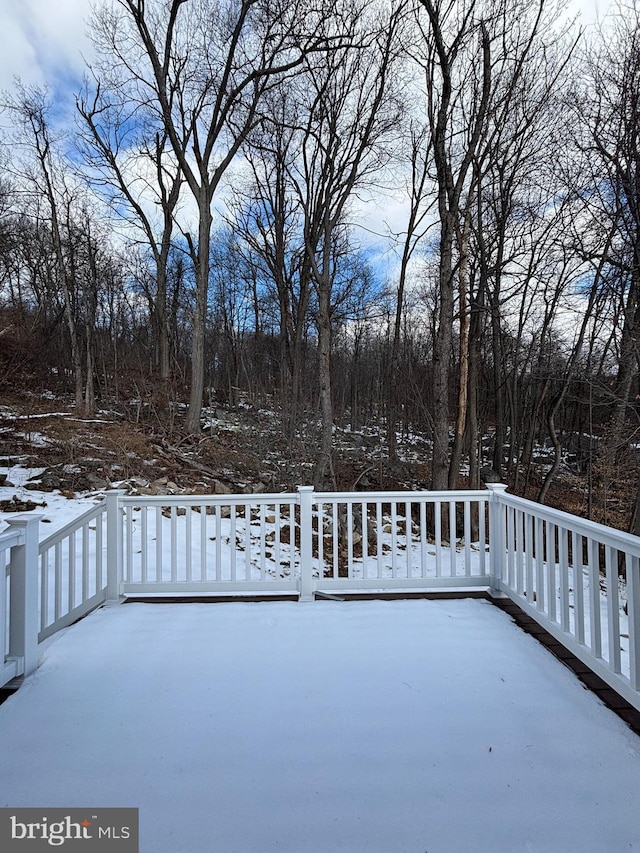 view of snow covered patio