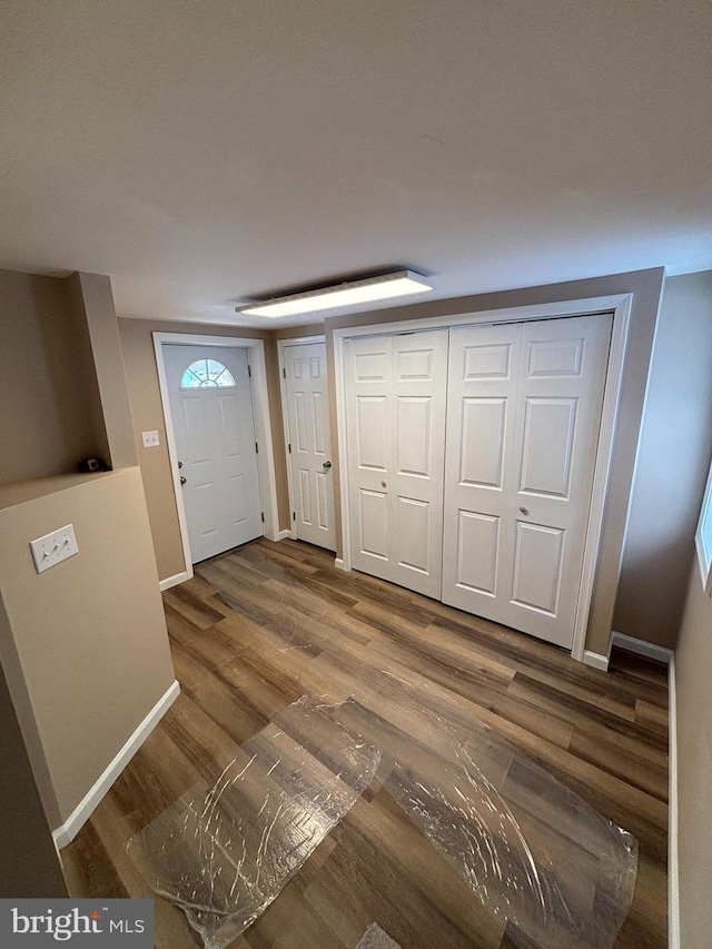 entrance foyer featuring hardwood / wood-style flooring