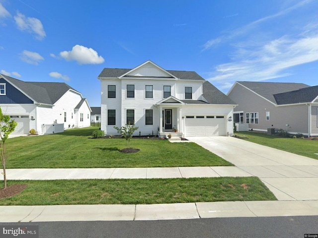 view of front facade with central AC unit, a garage, and a front yard