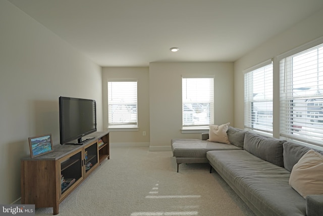 living room with light colored carpet