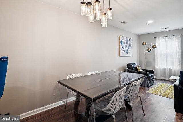 dining area featuring hardwood / wood-style floors