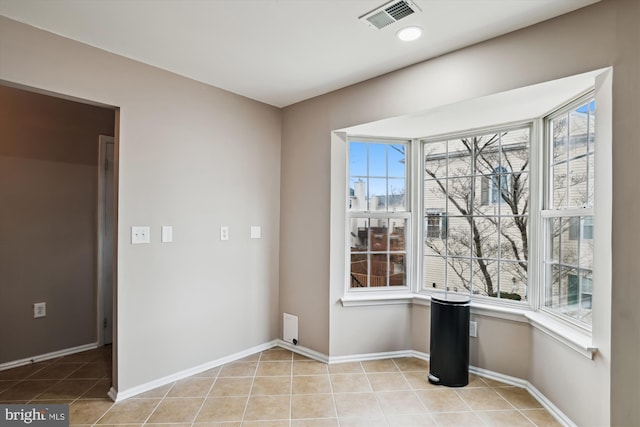 interior space featuring light tile patterned floors