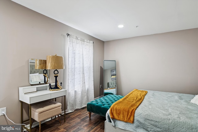 bedroom featuring dark wood-type flooring