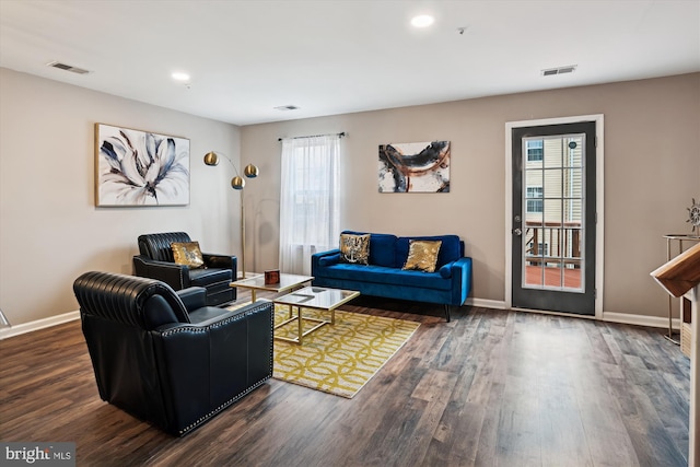 living room with dark wood-type flooring