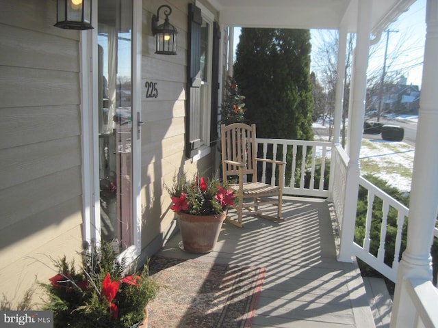 balcony featuring a porch