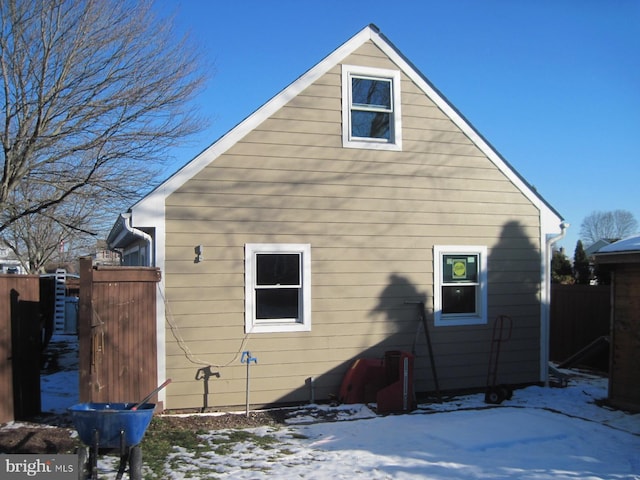 view of snow covered property