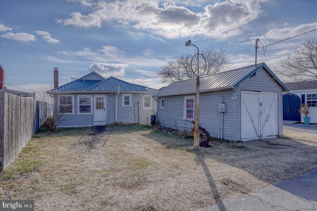 exterior space featuring a storage unit