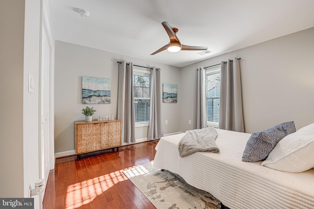 bedroom featuring ceiling fan and wood-type flooring