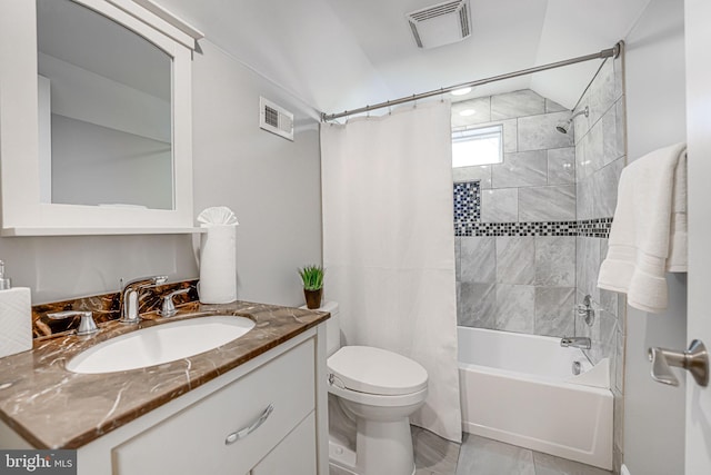 full bathroom with vanity, toilet, and shower / tub combo