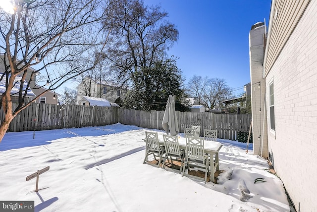 view of yard covered in snow