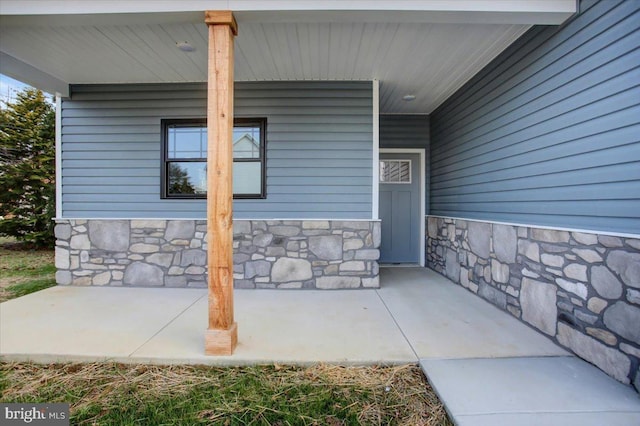 entrance to property with a porch