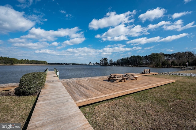 view of dock with a water view