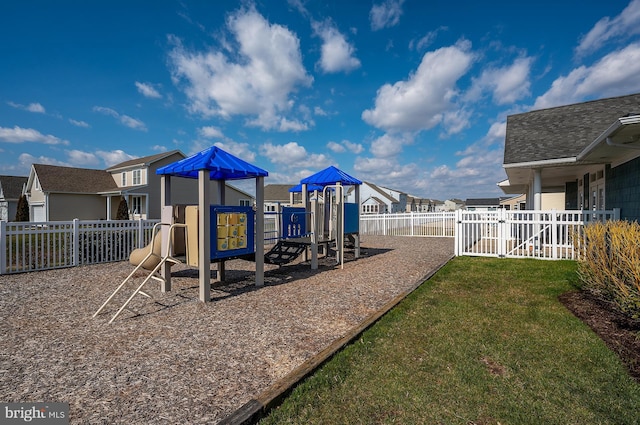 view of jungle gym with a lawn