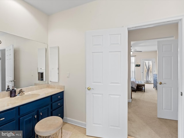 bathroom featuring vanity and ceiling fan