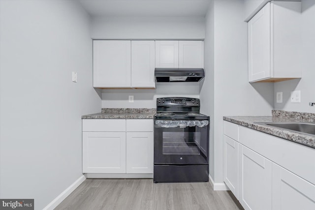 kitchen with electric range, sink, white cabinets, and light wood-type flooring