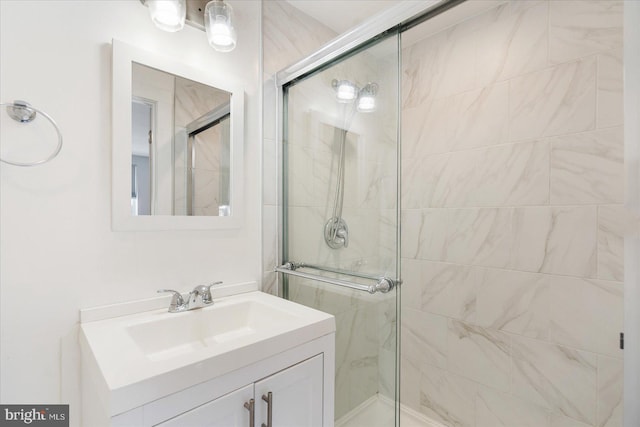 bathroom featuring vanity and walk in shower