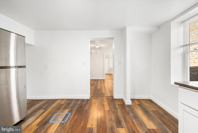 interior space with dark hardwood / wood-style flooring