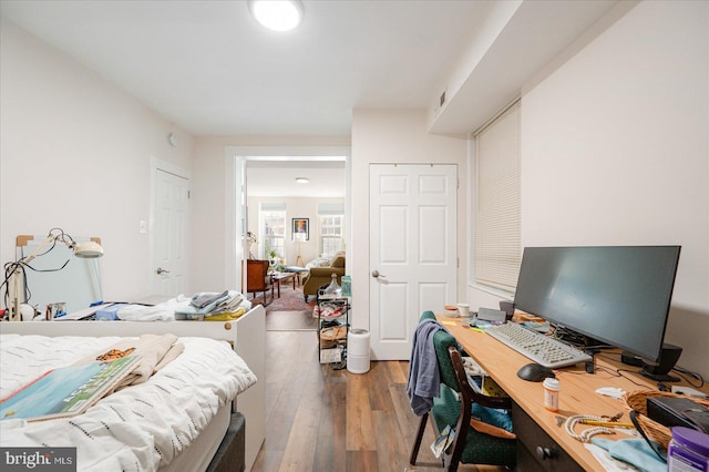 bedroom featuring hardwood / wood-style flooring