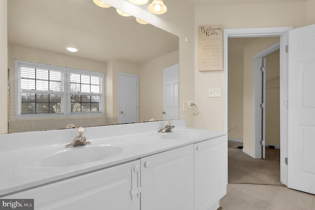 bathroom featuring tile patterned floors and vanity