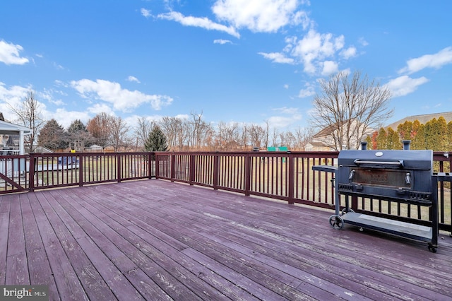 wooden deck with area for grilling