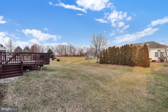 view of yard featuring a deck