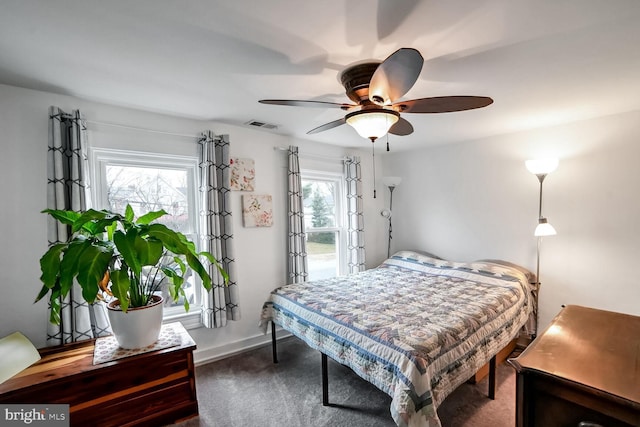 carpeted bedroom with ceiling fan